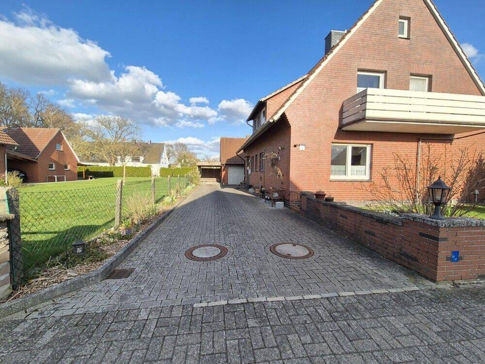 Immobilie in Varrel - Familientraum mit wunderschönem Garten in 27259 Varrel! - Bild 1