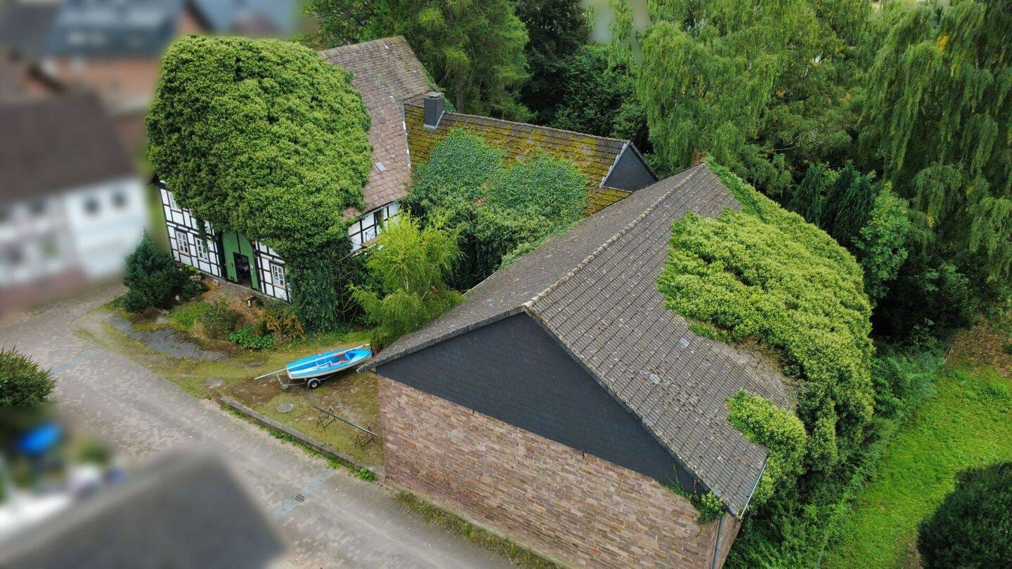 Immobilie in Lauenförde - Historischer Resthof mit viel Potenzial und parkähnlichem Garten in Lauenförde - Bild 2