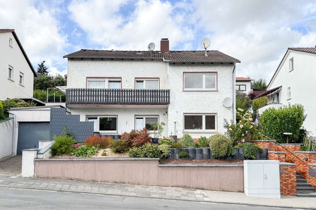 Immobilie in Reinheim - Sofort bezugsfrei – Attraktives Zweifamilienhaus für Familie und Generationen in Reinheim - Bild 0