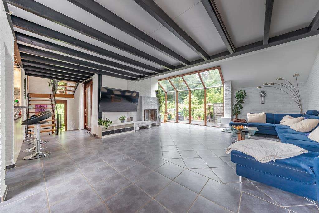 Immobilie in Aumühle - Architektonische Großzügigkeit:
"Splitlevel auf traumhaften Grundstück mit schönen Ausblicken" - Bild 3