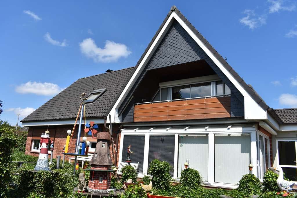 Immobilie in Mildstedt - Mehr Raum für Ihr Leben: Familienfreundliches Zuhause mit Wintergarten - Bild 3