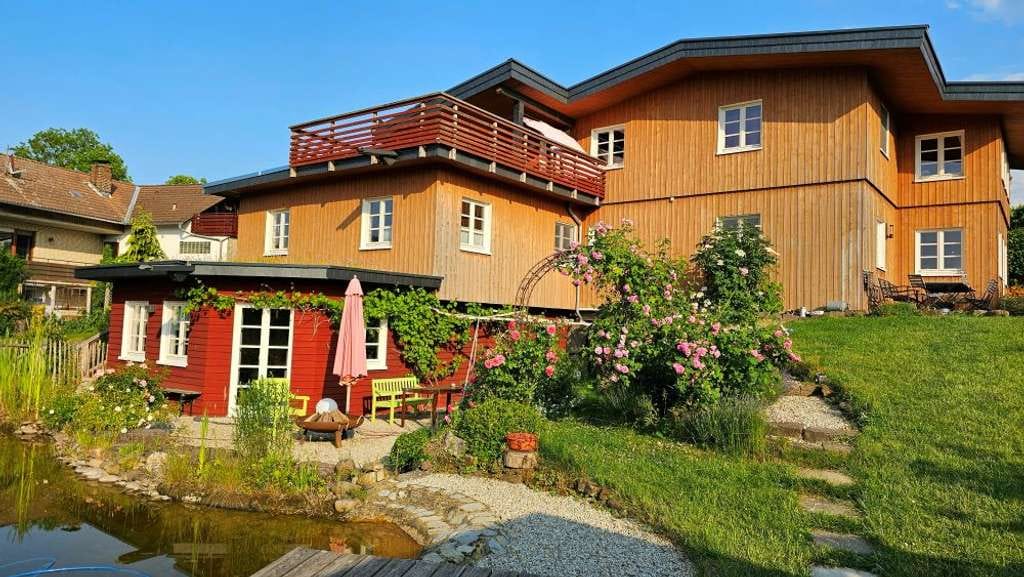Immobilie in Hardegsen - Exklusives Massivholz-Haus mit vielseitiger Nutzung in idyllischer Lage - Bild 1