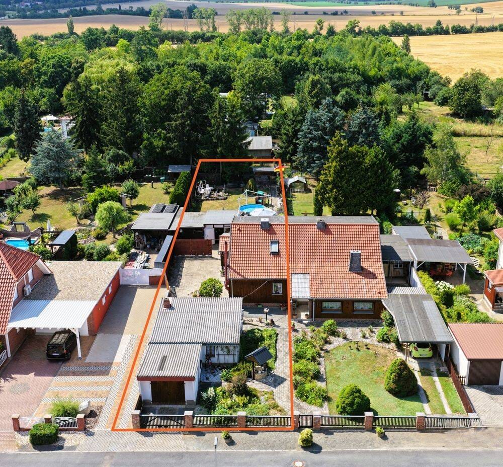 Immobilie in Quedlinburg - Klein wohnen, draußen groß leben -Doppelhaushälfte in Quedlinburgs Kleisiedlung- viel Platz ums Haus - Bild 0