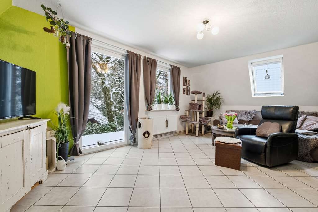 Immobilie in Buchholz in der Nordheide - Charmante Dachgeschosswohnung – ruhig gelegen in Holm-Seppensen - Bild 1