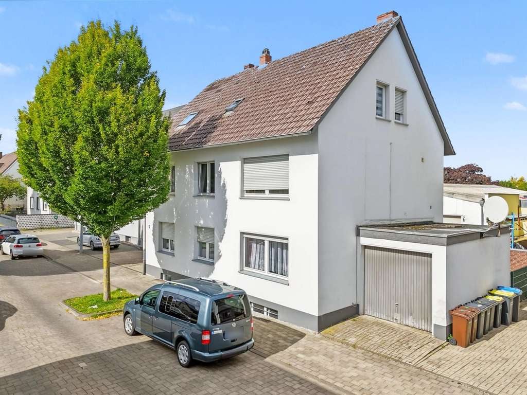 Immobilie in Beckum - Mehrfamilienhaus mit 3 Wohneinheiten, Garage und Entwicklungspotenzial in Beckum - Bild 0