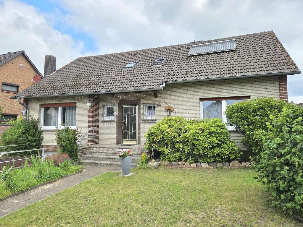 Immobilie in Munster - Gepflegtes Zweifamilienhaus mit Tiefgarage und Sauna in ruhiger Lage von Munster-Breloh - Bild 1