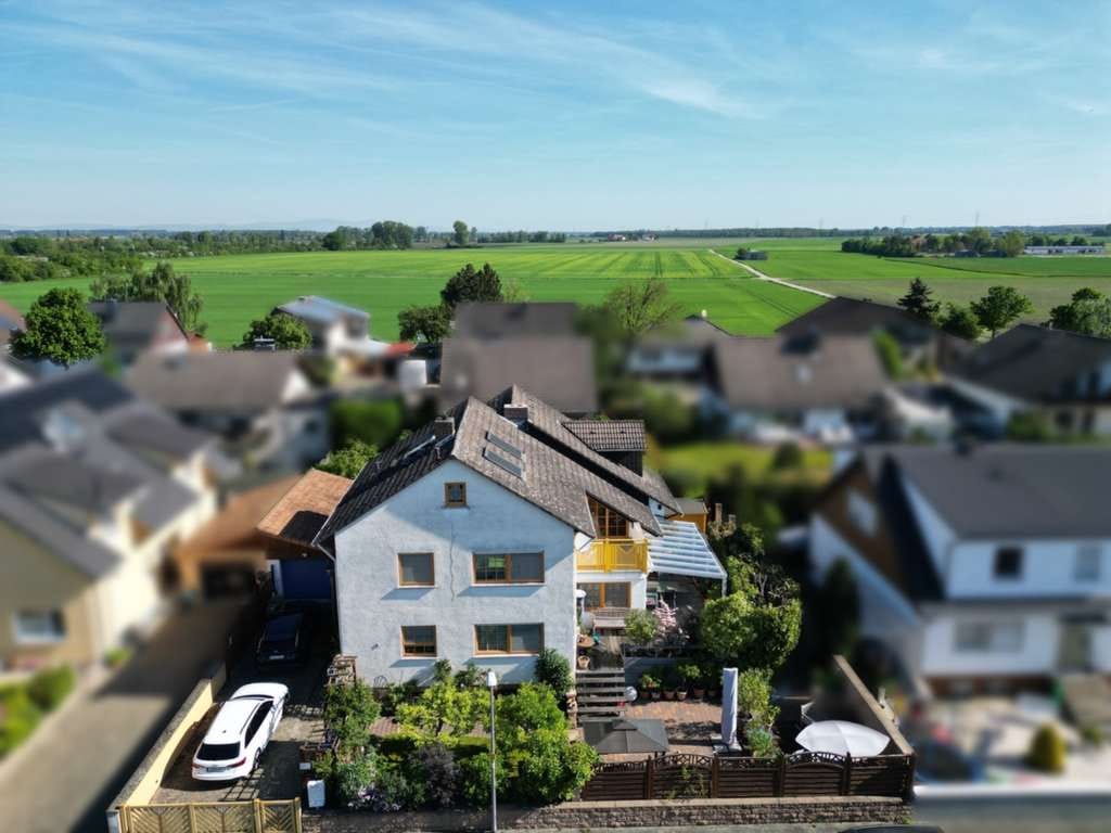 Immobilie in Riedstadt - Großzügig wohnen, professionell arbeiten – Haus mit separatem Bürobereich - Bild 1