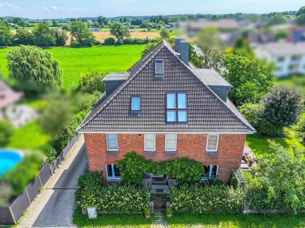 Immobilie in Schretstaken - 21493 Schretstaken - Gepflegte 3-Zimmer-Eigentumswohnung mit Balkon und Garten - Bild 1