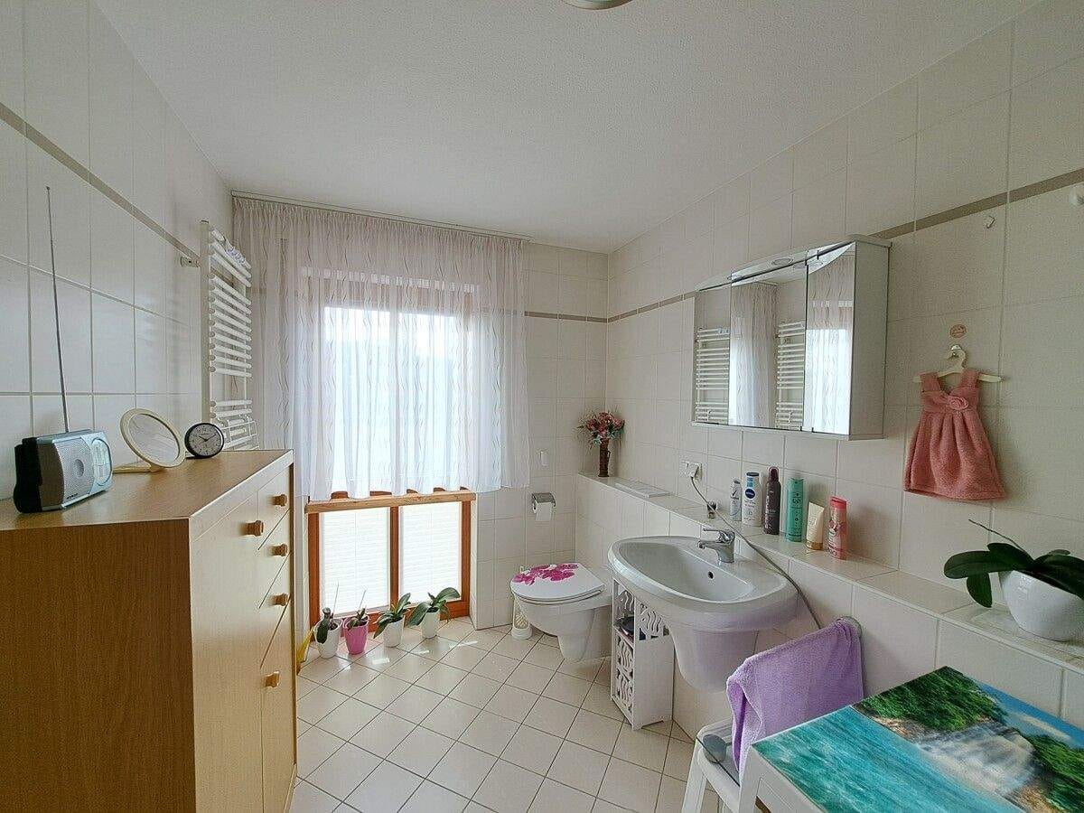 Immobilie in Mulda/Sachsen - Stilvolle Erdgeschoss-Wohnung zum Verkauf: 4 Räume, Tiefgarage, großzügige Terrasse in Mulda/Sa.! - Bild 4