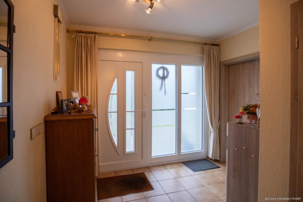Immobilie in Klein Offenseth-Sparrieshoop - Geschmackvoll und individuell -  Bungalow in Klein Offenseth-Sparrieshoop - Bild 1
