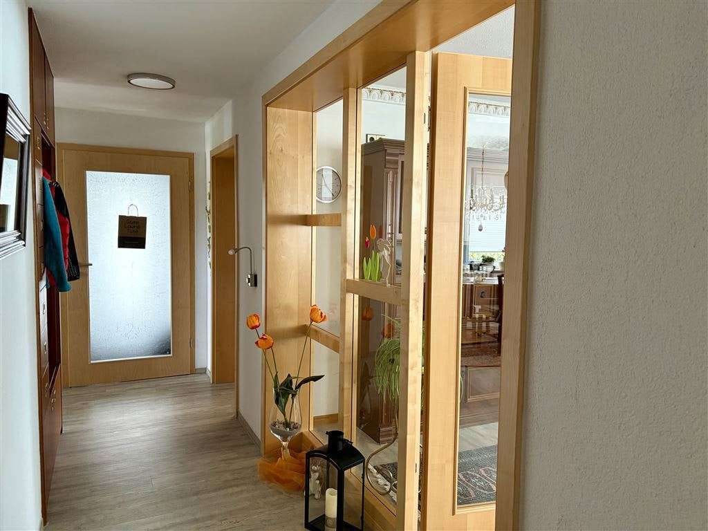 Immobilie in Jagstzell - Stilvolle Erdgeschosswohnung mit zwei überdachten Terrassen und mediterranem Wohnflair - Bild 3