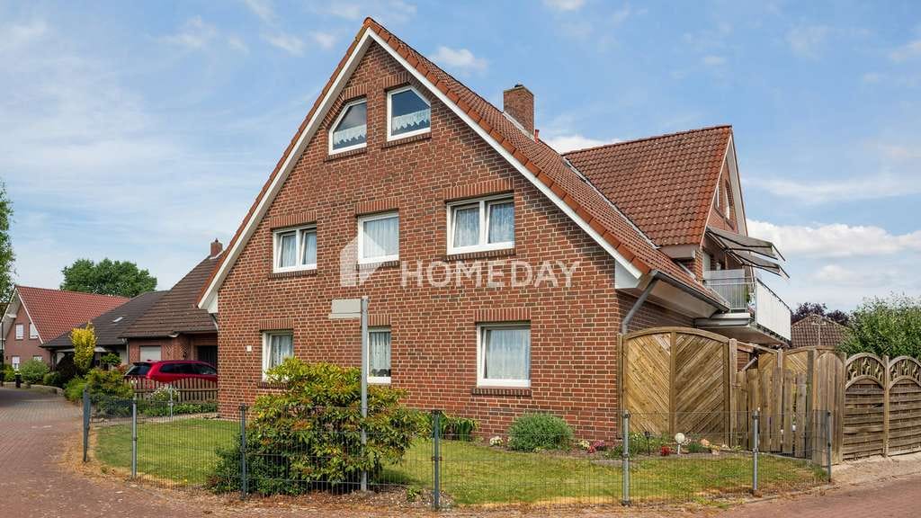 Immobilie in Menslage - Mehrfamilienhaus mit 4 Wohneinheiten, Garten, Dachboden, Carports und ca. 360 m² Wohnfläche - Bild 1