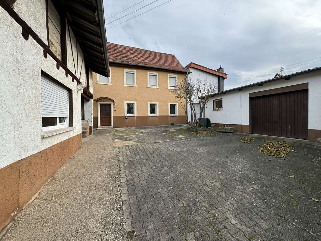 Immobilie in Hüffelsheim - Preiswertes 6-Raum-Mehrfamilienhaus in Hüffelsheim - Bild 0