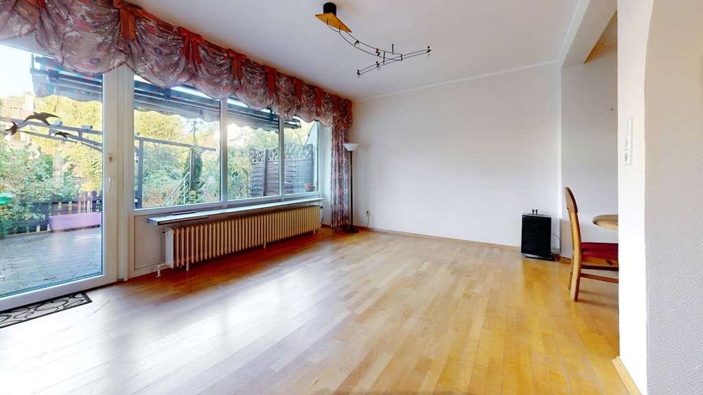 Immobilie in Hambühren - Charmantes Reihenmittelhaus mit Potenzial in ruhiger Lage - Bild 1