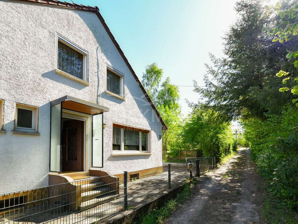 Immobilie in Carlsberg - Ankommen im Grünen: Ein Zuhause zwischen Waldlichtung und Familienalltag - Bild 1