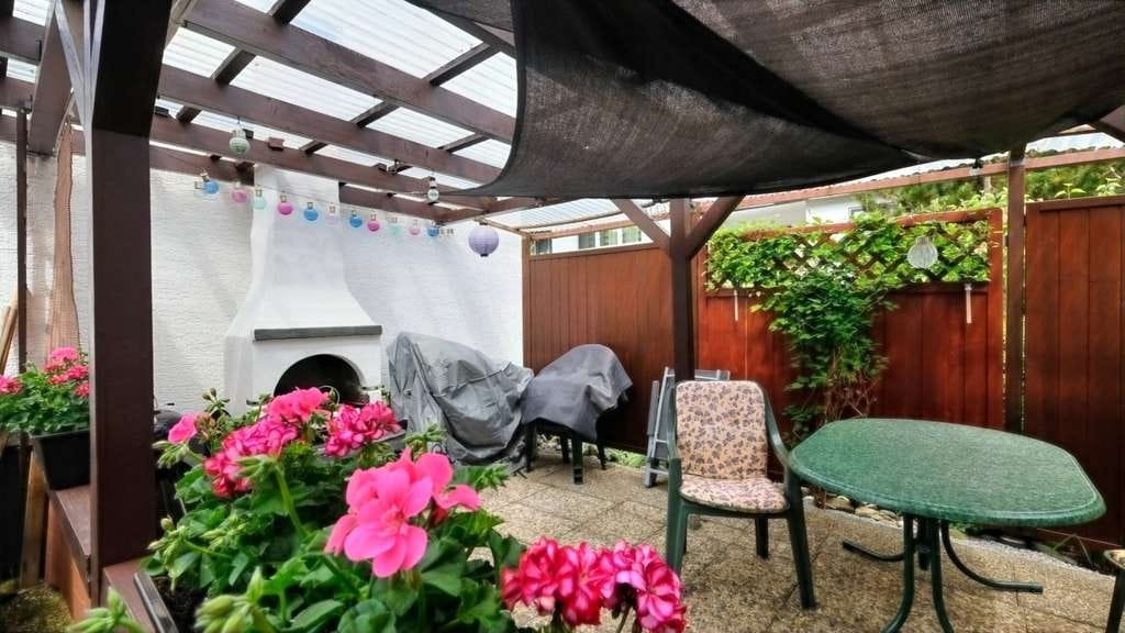 Immobilie in Gottmadingen - Kleines Familienglück mit Wintergarten in Grenznähe - Bild 1