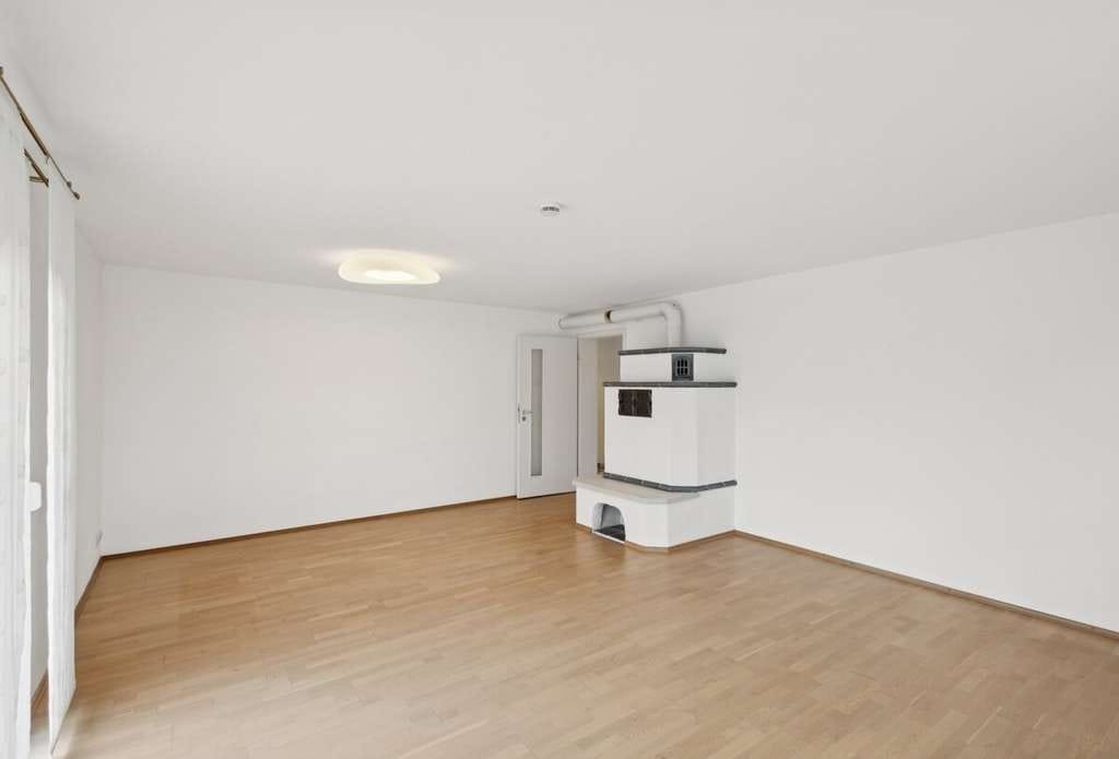 Immobilie in Petersdorf - Ihr Rückzugsort im Grünen: Wohnung mit Kamin, Garage und Garten - Bild 3