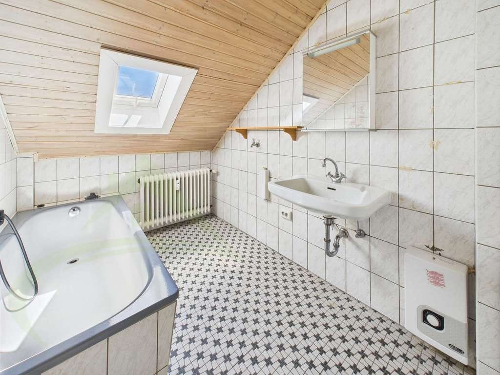 Immobilie in Holzappel - Attraktives Mehrfamilienhaus mit 4 Wohneinheiten – gepflegt, voll vermietet und solide investiert - Bild 3