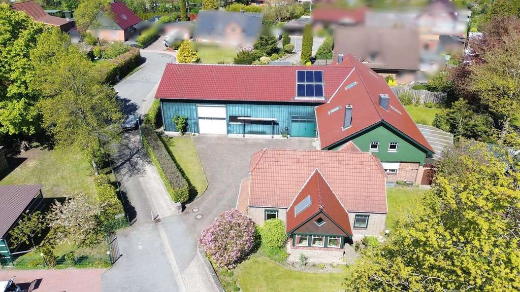 Immobilie in Fockbek - Großes Einfamilienhaus mit Gewerbehalle zentral in Fockbek / Ideal für Handwerk und Handel - Bild 0
