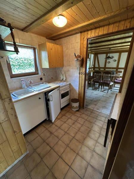 Immobilie in Guxhagen - ***Massiv, naturnah und solide*** Gepflegtes und freistehendes Wochenendhaus mit Carport  in Guxhagen-Ellenberg - Bild 1