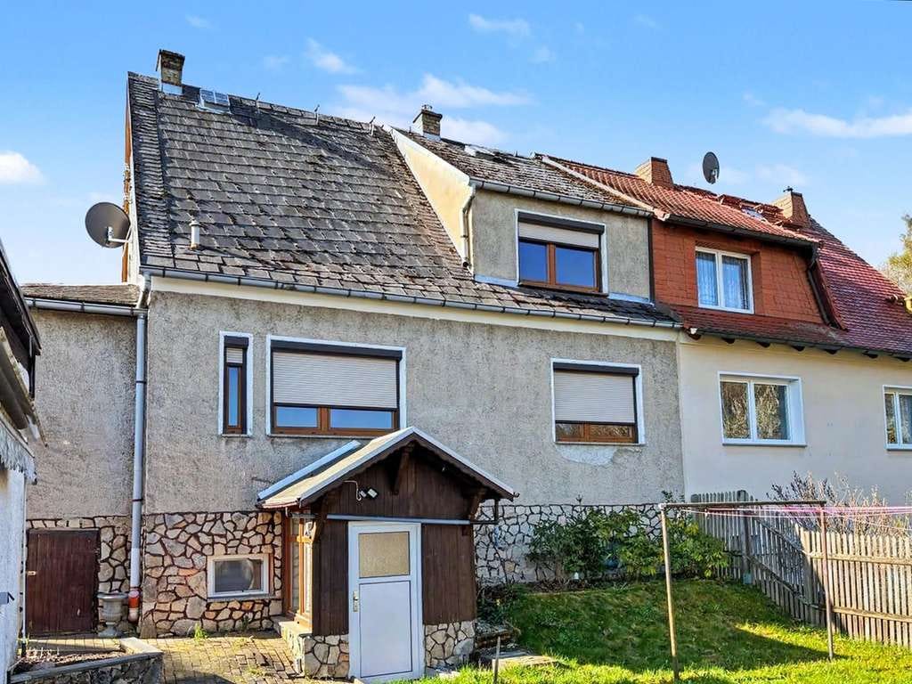 Immobilie in Auma-Weidatal - Solide Doppelhaushälfte mit Doppelgarage in Auma-Weidatal - Bild 1