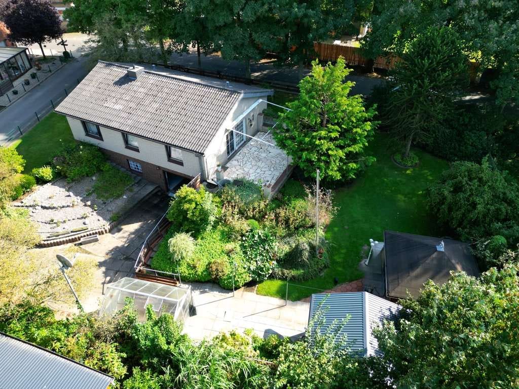 Immobilie in Dellstedt - Viel Platz und Potenzial: Haus mit Terrasse, Vollkeller, Tiefgarage und einem schönen Grundstück - Bild 4