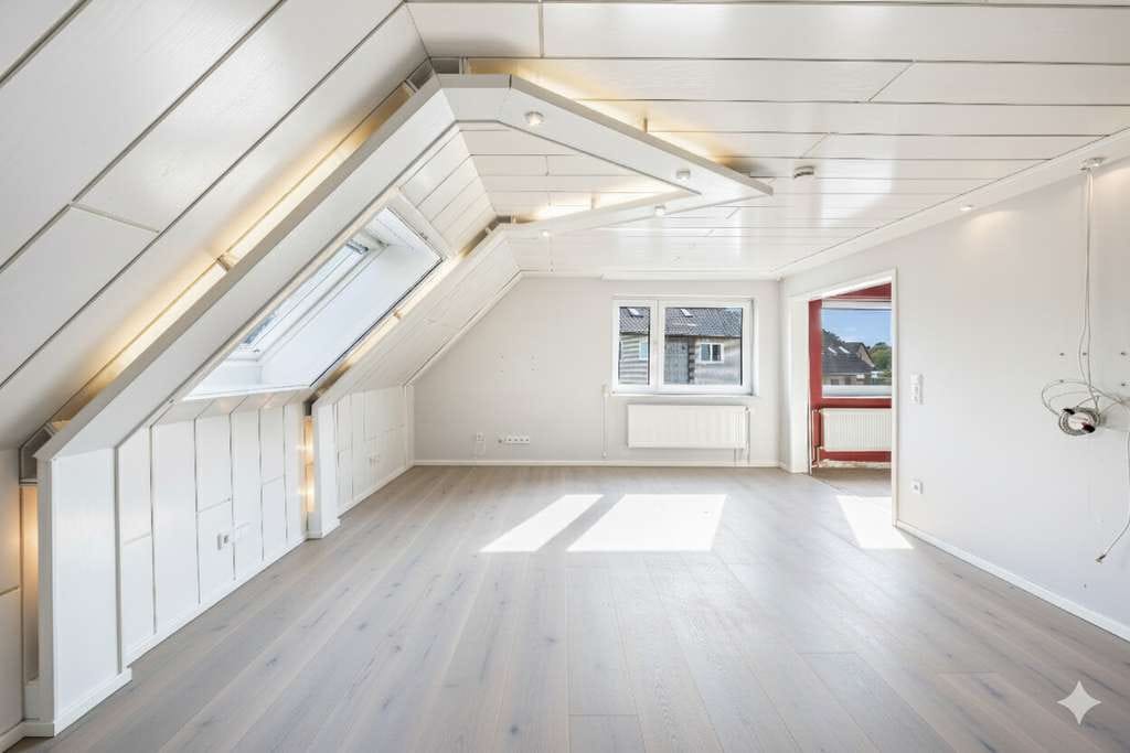 Immobilie in Wolfsburg - Moderne Dachgeschosswohnung + Ausbaureserve in beliebter Wolfsburger Lage - Bild 4
