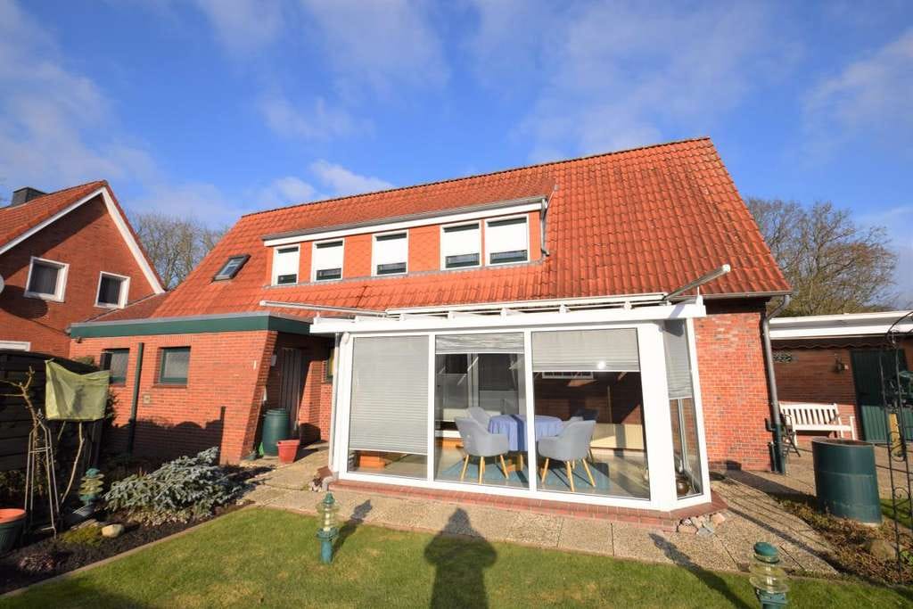 Immobilie in Leer - Leer - zenrale Lage - Gepflegtes Wohnhaus mit Wintergarten und großer Garage - Bild 1