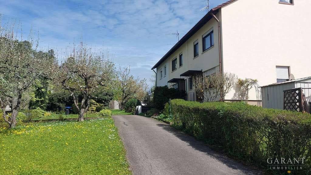 Immobilie in Frickenhausen - Ein Haus zum Wohlfühlen mit Wintergarten, Balkon und separater Garage - Bild 1