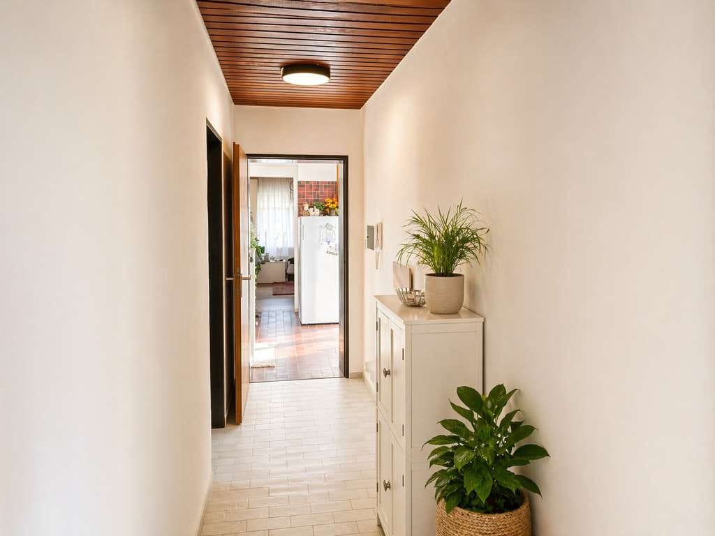 Immobilie in Kusterdingen - Charmante Dachgeschosswohnung mit sonniger Terrasse und traumhaftem Weitblick ins Grüne - Bild 4