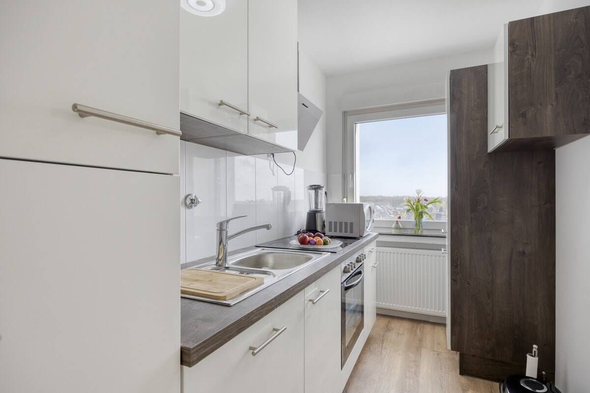 Immobilie in Dorsten - Stilvoll modernisierte 3-Zimmer-Wohnung mit Weitblick & Tiefgarage - Bild 4
