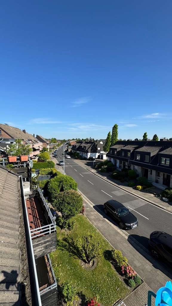 Immobilie in Moers - traumhafte Maisonette-Wohnung mit großzügigem Balkon & Garage - Bild 1