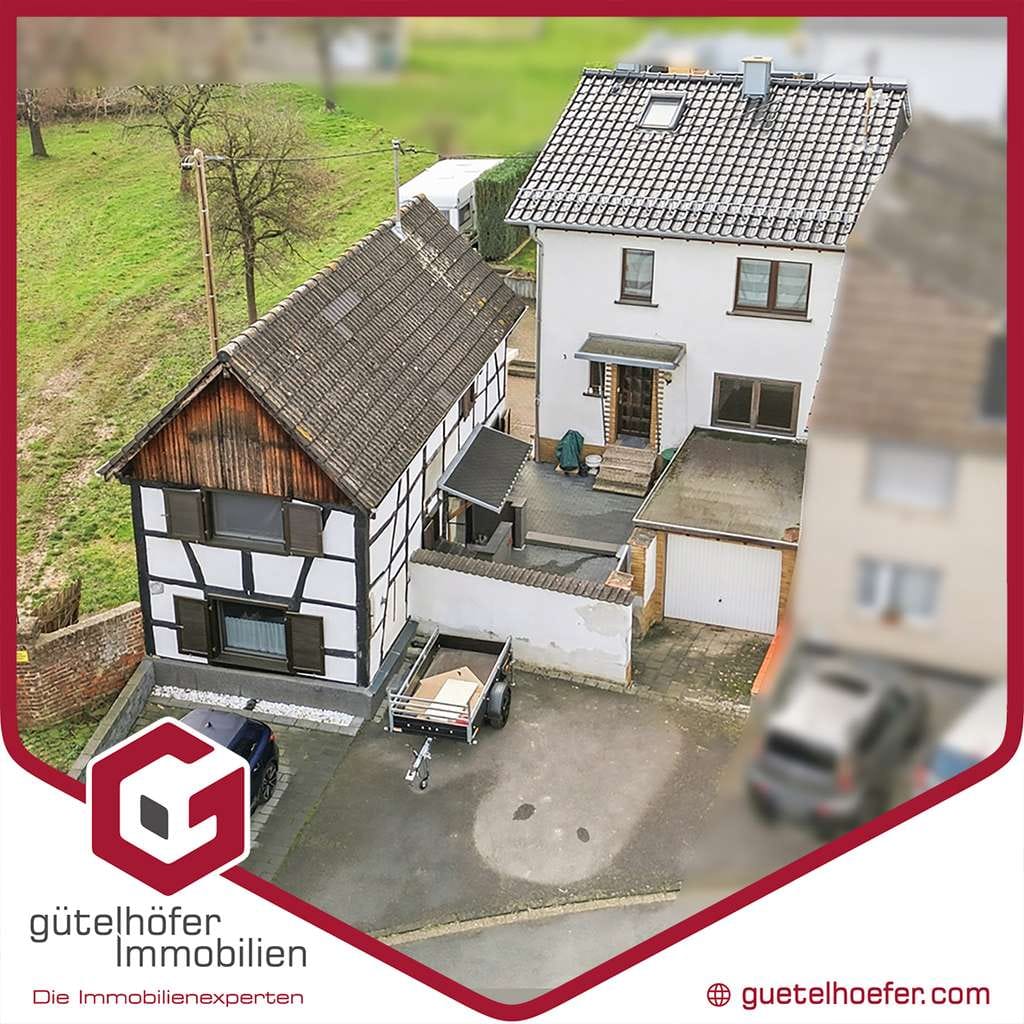 Immobilie in Rheinbach - Zwei auf einen Streich! Teilmodernisierte Doppelhaushälfte und gemütliches Fachwerkhaus in Oberdrees - Bild 0