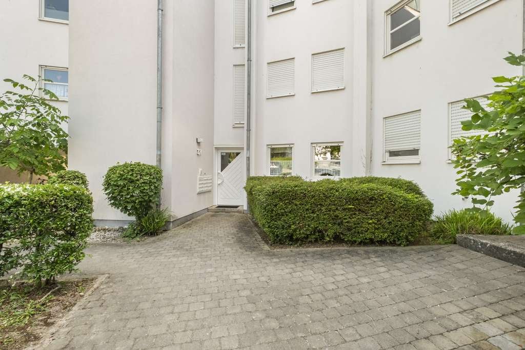 Immobilie in Osthofen - 2-Zimmer-EG-Wohnung mit Privatgarten, Terrasse und Stellplatz in Osthofen - Bild 1