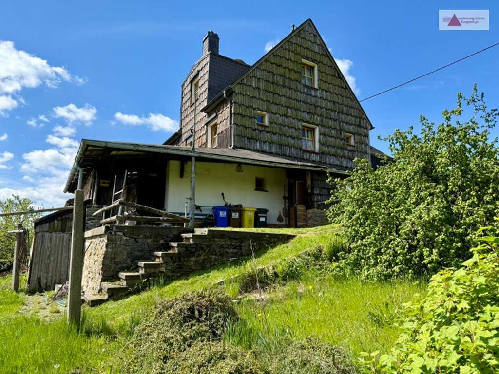 Immobilie in Bärenstein - Einfamilienhaus mit Weitblick in Bärenstein im Erzgebirge – großes Grundstück & Ausbaupotenzial - Bild 0