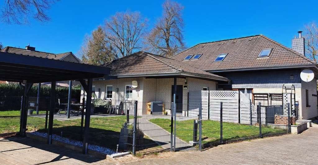 Immobilie in Hohenlockstedt - Bungalow - Erdgeschoss-Hausteil im Zweifamilienhaus - Bild 1