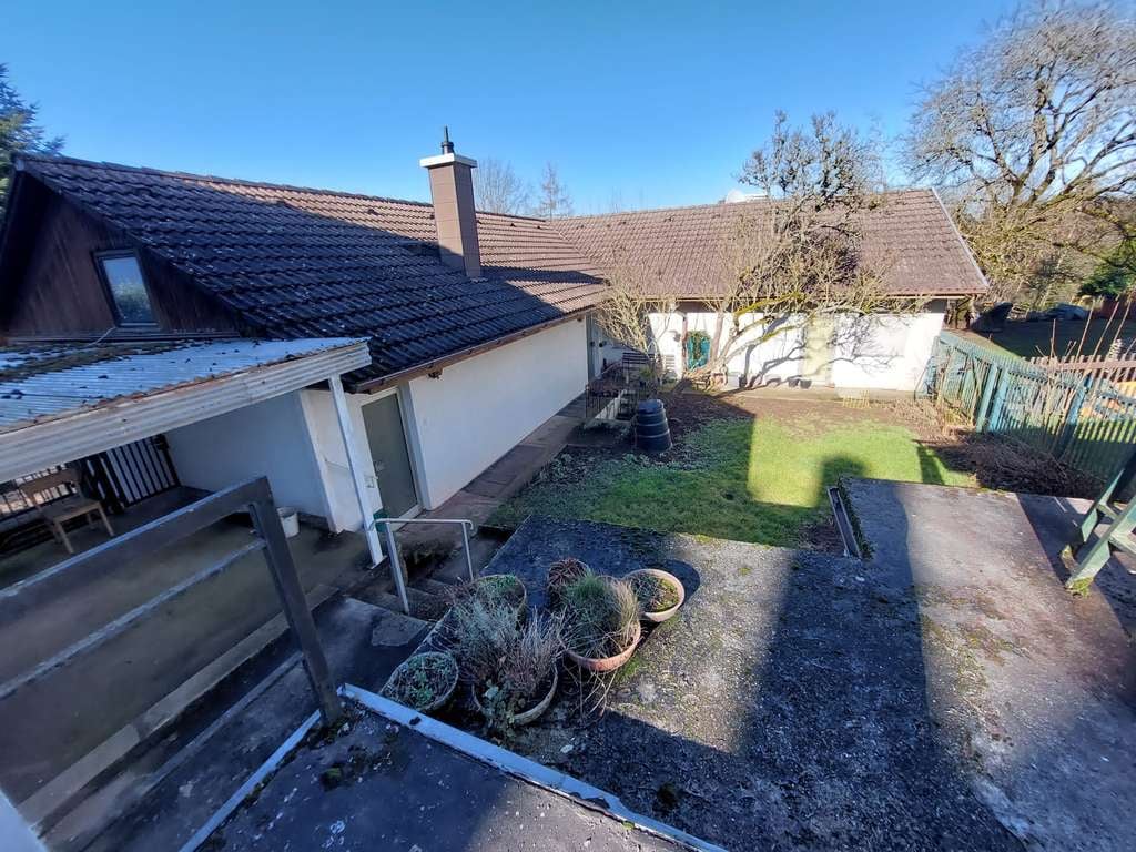 Immobilie in Pirmasens - Gebäudeensemble mit Einfamilienhaus, Wohn- und Geschäftshaus,  Doppelhaushälfte und Nebengebäuden - Bild 2