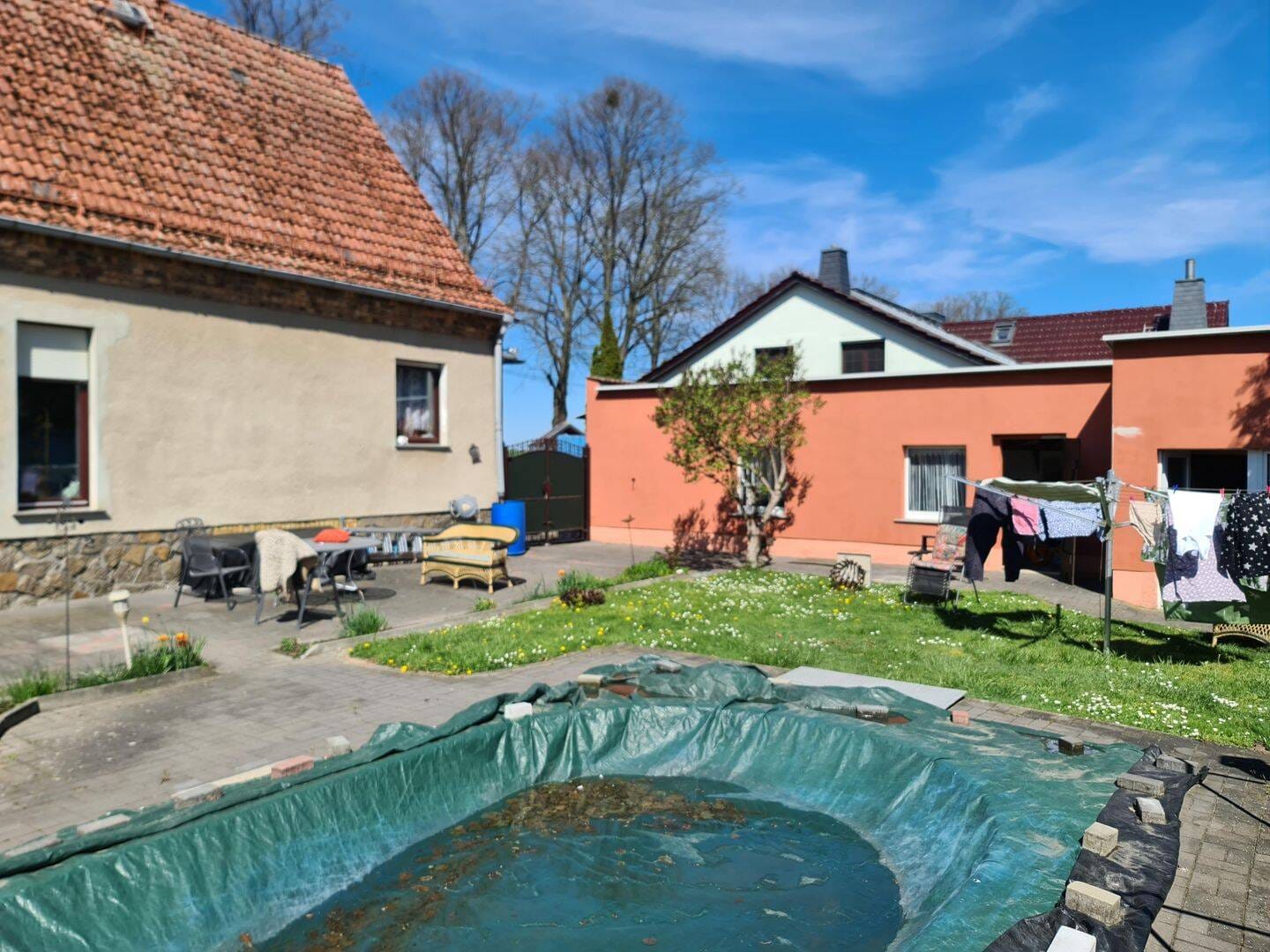 Immobilie in Niederer Fläming - Gepflegtes Einfamilienhaus mit Pool, großzügigem Nebengelass und ruhiger Wohnlage - Bild 1