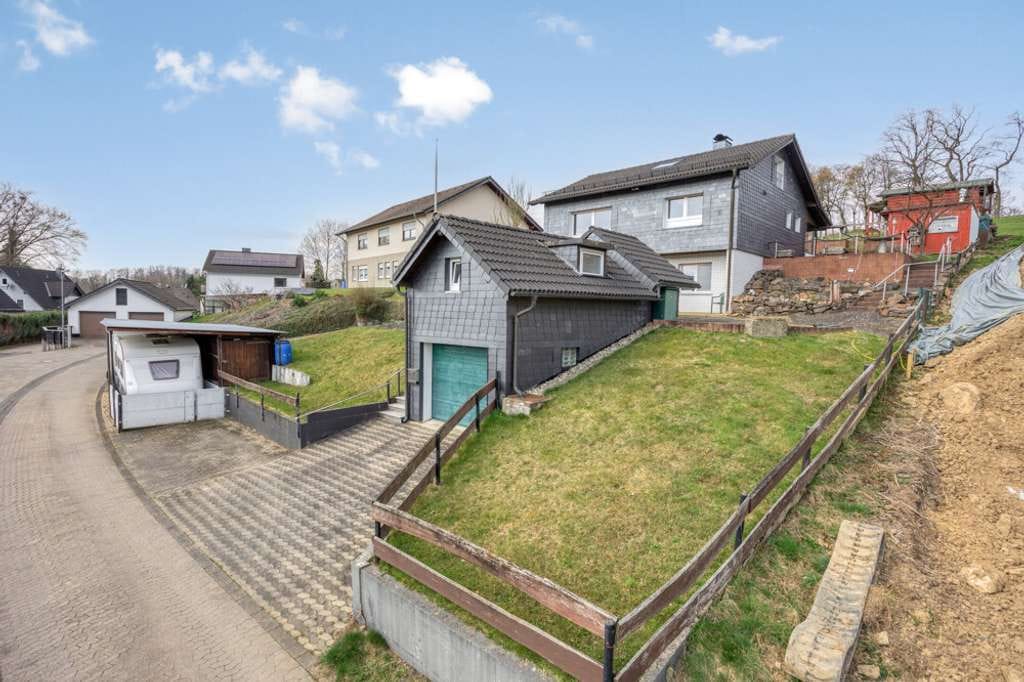 Immobilie in Wipperfürth - Einfamilienhaus mit viel Potenzial in grüner Lage von Wipperfürth Ohl - Bild 1