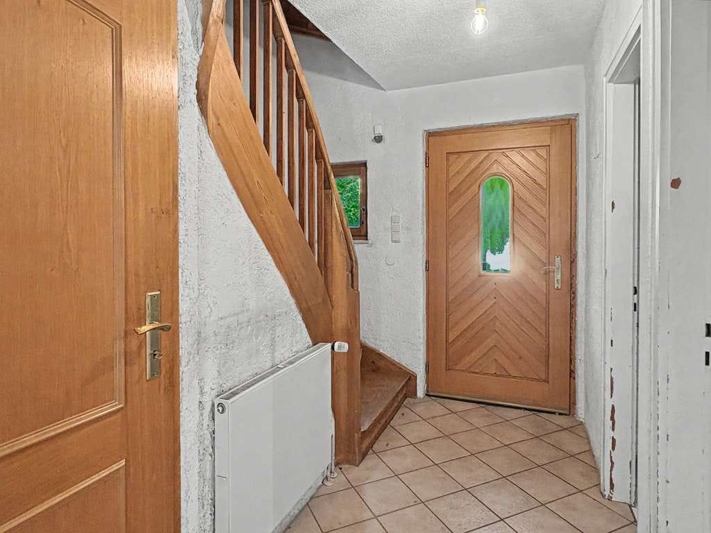 Immobilie in Pullach im Isartal - Idyllisches Reihenmittelhaus mit viel Potential in Pullach im Isartal - Bild 1