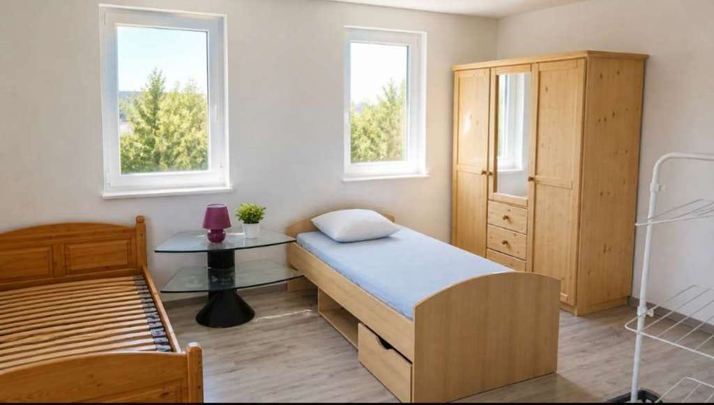 Immobilie in Straubenhardt - Sanierungsbedürftige Doppelhaushälfte mit Schuppen - Bild 4