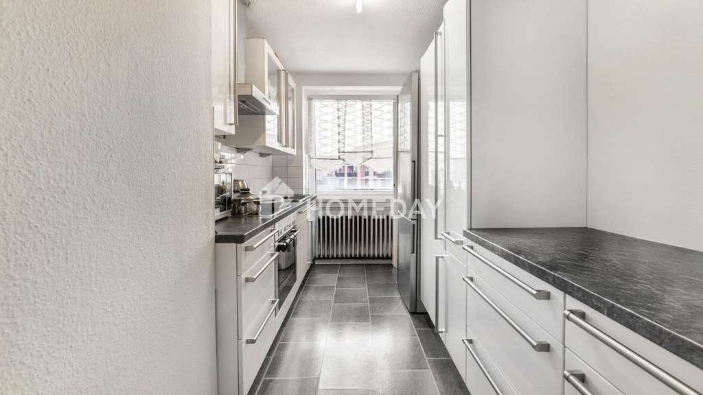 Immobilie in Oer-Erkenschwick - Vermietete 4-Zimmer-Wohnung mit Balkon und Garage in gepflegtem Mehrfamilienhaus  - Bild 1