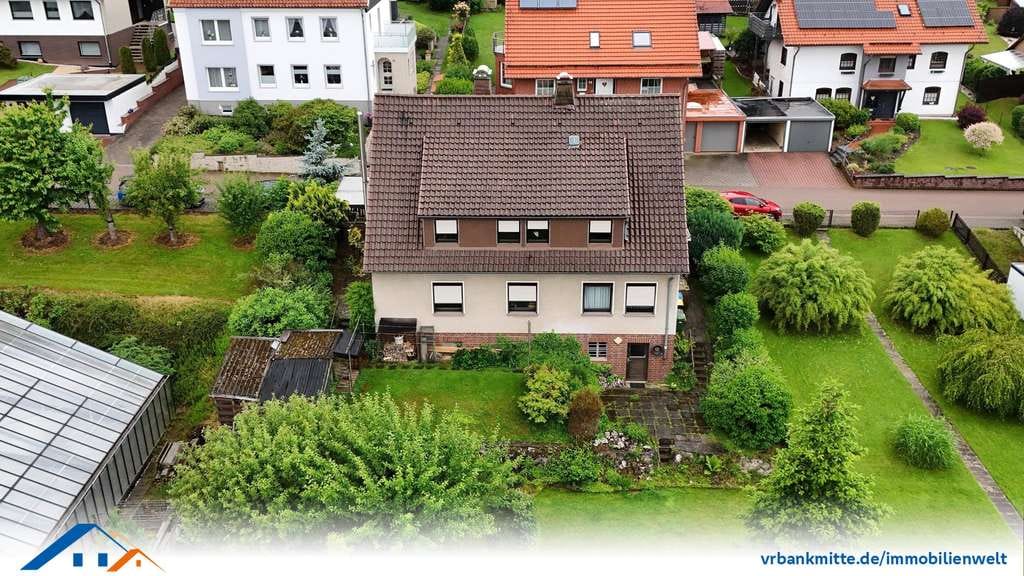 Immobilie in Bilshausen - Vielseitiges Zweifamilienhaus mit Garten und Fernblick - Bild 1