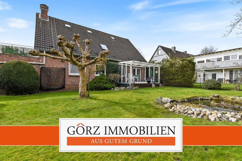 Immobilie in Tangstedt - Schönes Zweifamilienhaus in ruhiger, zentraler Lage am Dorfteich! Eine Wohnung frei, eine vermietet - Bild 0