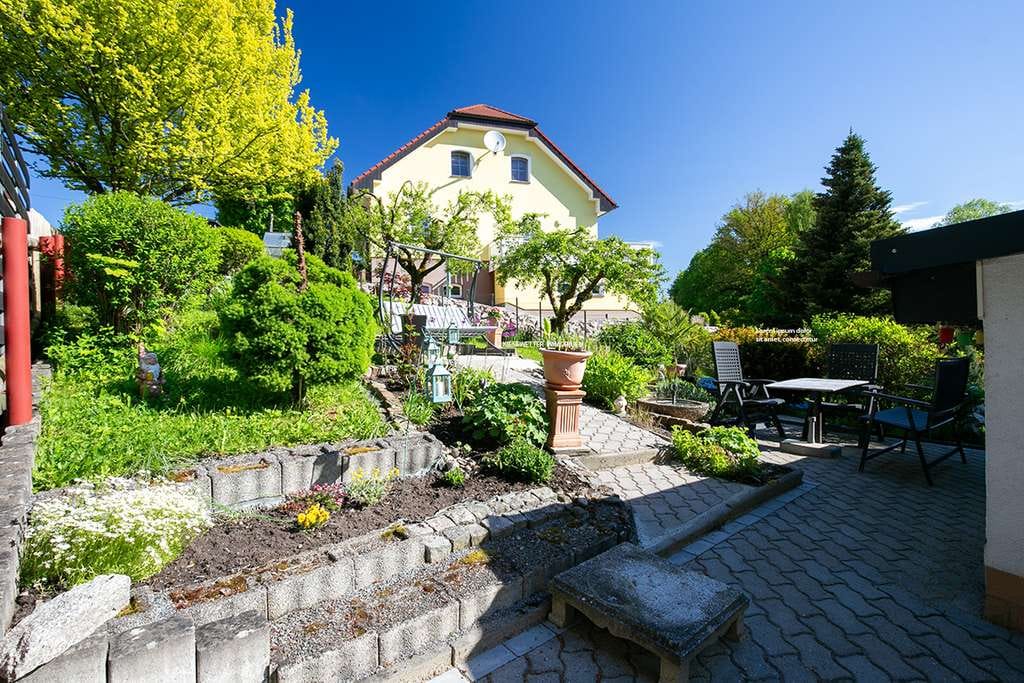 Immobilie in Wildenfels - GEPFLEGTES MEHRFAMILIENHAUS MIT GARAGE & TERRASSE IN IDYLLISCHER LAGE ! - Bild 1