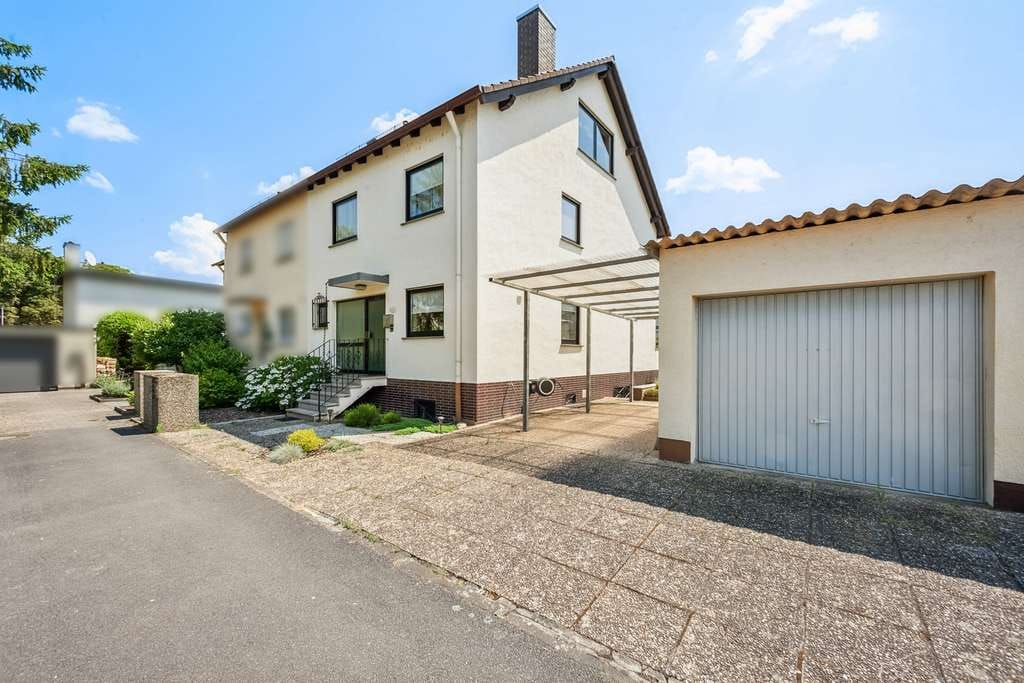 Immobilie in Kleinostheim - Wohnen, wo andere Urlaub machen – Ihr Zuhause mit Mainblick und Gartenidylle - Bild 0