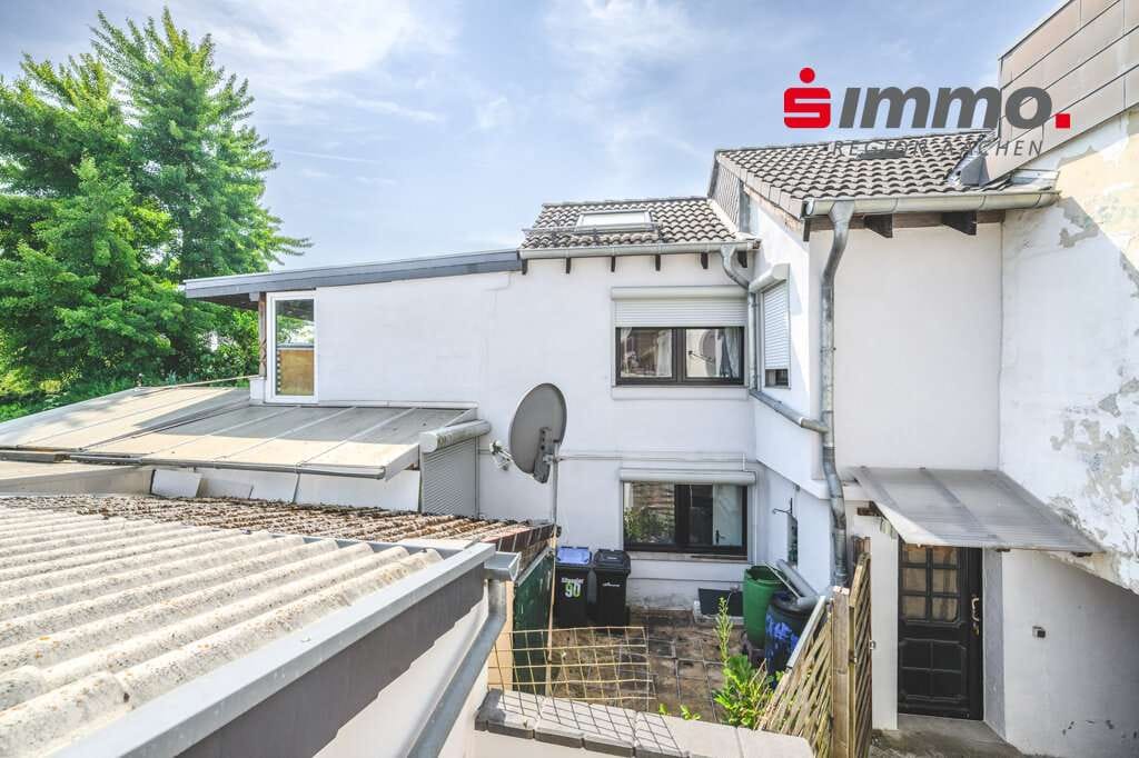 Immobilie in Würselen - Siedlungshaus mit 2 Wohneinheiten und schönem Garten - Bild 0