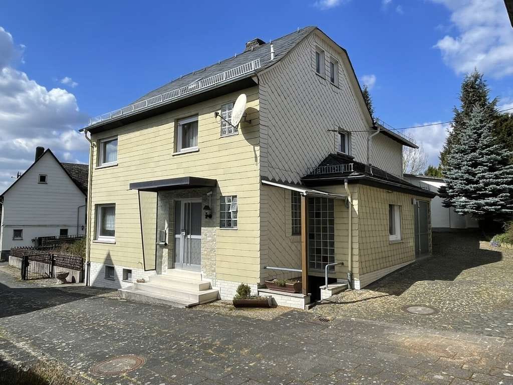Immobilie in Hohenahr - 35644 Hohenahr-Mudersbach

Wohnhaus mit Nebengebäuden auf einem großartigem Grundstück - Bild 1