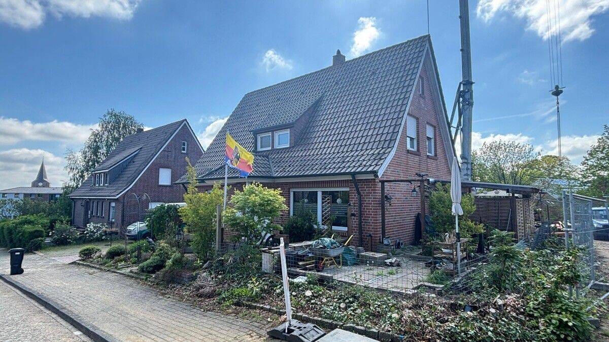 Immobilie in Uelsen - Einfamilienhaus in zentraler Lage von Uelsen - Bild 1