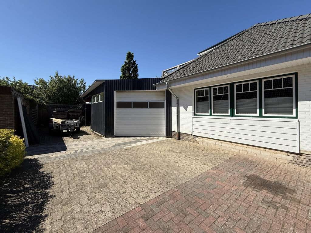 Immobilie in Großenwiehe - Großzügiges Einfamilienhaus im Dorfkern mit Handwerkerhalle – ideal für Handwerker und Familien - Bild 2